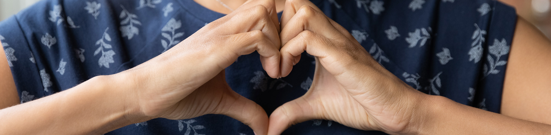 Hands form a heart